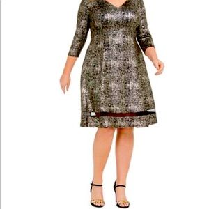 Macy’s Black and gold shimmery dress.